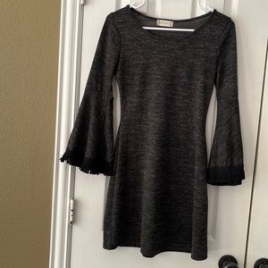 Altar’d State mini dress. Charcoal color, Bell sleeves with fringe. Size small